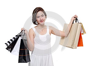 Shopping woman asian happy smiling holding shopping bags isolated on white background