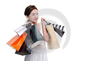 Shopping woman asian happy smiling holding shopping bags isolated on white background