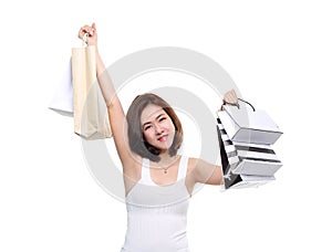 Shopping woman asian happy smiling holding shopping bags isolated on white background