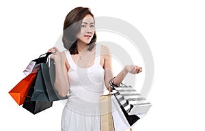 Shopping woman asian happy smiling holding shopping bags isolated on white background