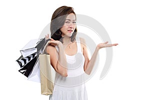 Shopping woman asian happy smiling holding shopping bags isolated on white background