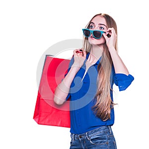 Shopping woman happy smiling holding shopping bags and exited about sales