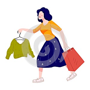 Shopping woman rushing to buy clothes in shop