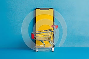 Shoppingcart smartphone against vibrant blue backdrop