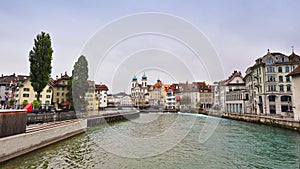 Shops and houses along the bank of Reuss River in Lucerne, Switzerland