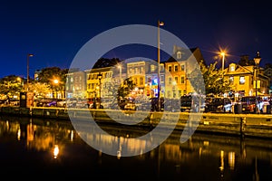 Shops and restaurants at night in Fells Point, Baltimore, Maryland.