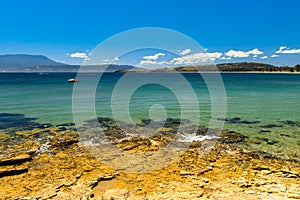 The shore of a beautiful beach in Tasmania, Australia