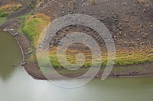 Shore of the Caidero de La Nina reservoir.