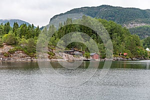 On the shore fjord occasionally are home.