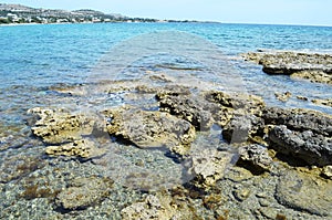 Stony shore of the Greek island of Rhodes. photo