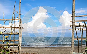 Shore of nato beach showing a bamboo fence in the Philippines