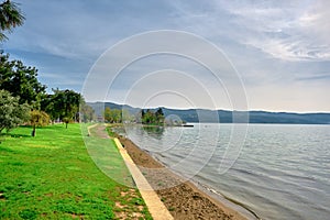 A shore and water`s edge of Nicaea iznik lake photo