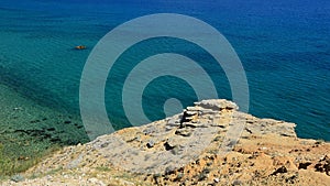 Shoreline arid rock above Sveta Maria beach on Pag Island, Croatia