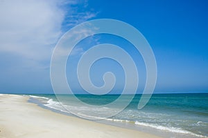 Shoreline and blue sky