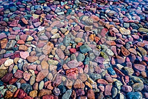 The shoreline of Lake McDonald in Glacier National Park