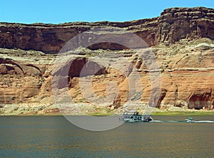 Shorelne with sandstone cliffs on Lake Powell of Lake Powell.