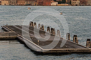 Shoreside - dock - swim - platform and seagulls in Venice, Italy