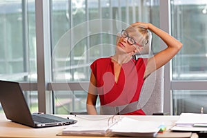 Short break for exercise on chair in office