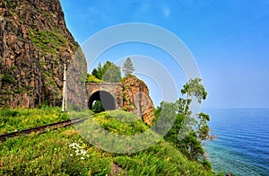 Short browsing railway tunnel on lake Baikal