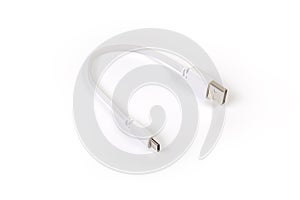 Short cable USB-A to USB-C on white surface