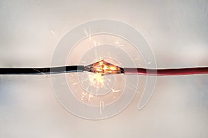 short circuit of electrical wiring sparks molten wires