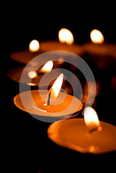 Short-cut candles burning