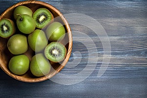 Short food supply chains SFSCs.From garden to plate concept.A bowl of fresh kiwis on the wood table.Flat lay,Copy space