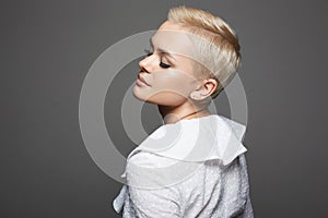 Short Hair Beautiful young woman. sensual girl with make-up and blond Hair