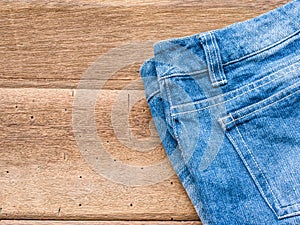 Short jean on wood background