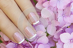 Short pink lilac French manicure.