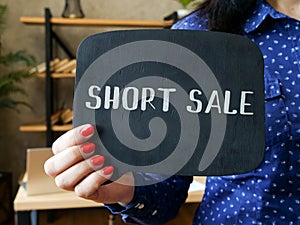 SHORT SALE phrase on the sheet