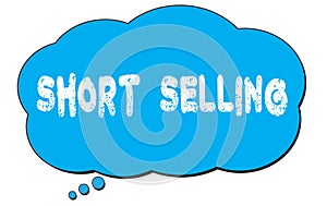 SHORT  SELLING text written on a blue thought bubble