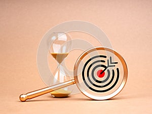 Short-term business goals encompass work that helps an organization reach its mid-term goals concept. Big target icon in gold