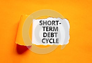 Short-term debt cycle symbol. Concept words Short-term debt cycle on beautiful white paper. Beautiful orange background. Business