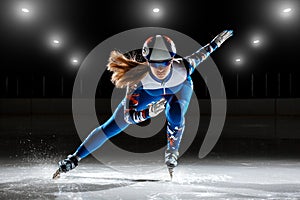 Short track athlete on ice photo