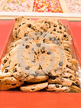 Shortbread with chocolate drops in a red box on the shelf in the store. Shortbread Cookies