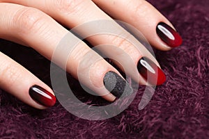 Shot beautiful manicure with gradient on female fingers. Nails design. Close-up