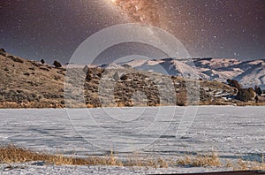 Shot of a beautiful sky full of stars of the Milky Way galaxy in the winter snowy day