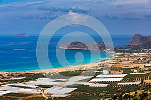Shot of beautiful turquoise beach Falasarna Falassarna in Crete, Greece. View of famous paradise sandy deep turquoise beach of