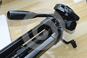 Tripod on angle Shot lay on a Decorated brown Table