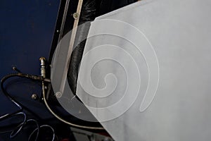 Shot blasting a metal panel