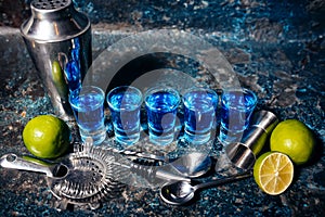 Shot of blue curacao alcoholic drinks, shot blue cocktails and lime