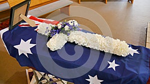 Shot of a colorful casket in a hearse or chapel before funeral or burial at cemetery