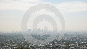 Shot of the downtown Los Angeles skyline bathed in smog from Griffith Park