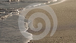 shot of evening waves on Cannes beach before sunset