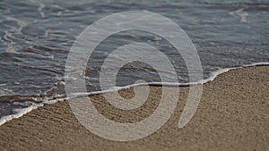 shot of evening waves on Cannes beach before sunset