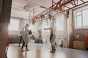 Shot of fitness group having workout session at gym