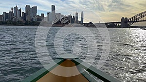 Shot with the Front of a ferry traveling towards the Sydney city skyline