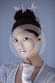 Shot of a futuristic young asian woman.