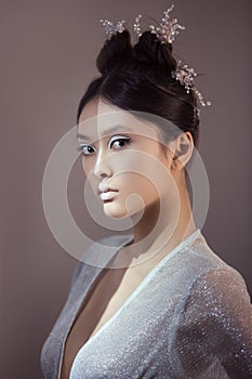 Shot of a futuristic young asian woman.